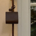 Brown leather dog waste bag holder