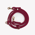 Load image into Gallery viewer, Hands-free braided leash in Bordeaux color by Southlake Paws, featuring gold clips and rings for versatility.