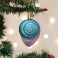 Load image into Gallery viewer, Fanciful Spiral Shell Ornament - Southlake Paws