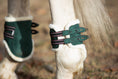 Load image into Gallery viewer, Southlake Paws Pine Grove Open-front Boots in green with white fleece lining, secured with adjustable straps on a horse's leg
