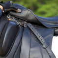 Load image into Gallery viewer, Stable Ride Stirrup Leathers by Southlake Paws attached to a saddle, showcasing a sleek black design and adjustable holes.