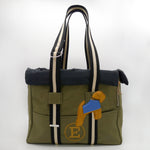 Green Bag And Black Dog Carrier