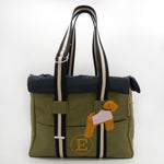 Green Bag And Black Dog Carrier