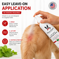 Load image into Gallery viewer, Southlake Paws Hot Spot Soothing Spray in a professional size bottle, applied to a dog's irritated skin area.