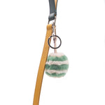 Fur keychain charm with colored stripes