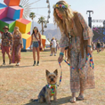 Load image into Gallery viewer, Tie Dye Dog Leash by EcoBark shown in use, featuring a woman in a bohemian outfit walking a small dog at an outdoor festival.