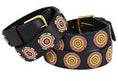 Load image into Gallery viewer, Southlake Paws TKC Primary Circles Belt Wide features a black leather design with colorful circular patterns and a brass buck