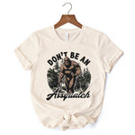 Don't Be a Sasquatch Funny T-Shirt, Retro Bigfoot White and Natural Tee for Outdoor and Camping Dads