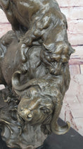 Load image into Gallery viewer, Fierce Lion vs. Buffalo – Hot Cast Bronze Wildlife Sculpture by Milo