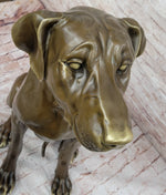 Lifelike Bronze Dog Statue – Realistic Sitting Dog Sculpture for Home or Garden Decor