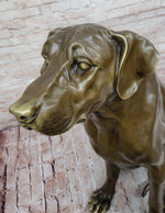 Lifelike Bronze Dog Statue – Realistic Sitting Dog Sculpture for Home or Garden Decor