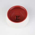 White and red ceramic dog bowl