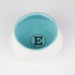 White and blue ceramic dog bowl