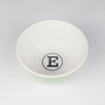 Green and white ceramic dog bowl