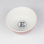 Red and white ceramic dog bowl