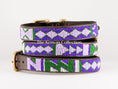 Load image into Gallery viewer, Beaded dog collar by Southlake Paws featuring a colorful geometric pattern in purple, green, and white on a brown leather bas