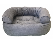 Bowsers Pet Products premium calming bed for pets in soft gray fabric with cushioned bolsters