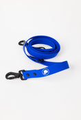 Load image into Gallery viewer, Royal Blue leash by The Modern Dog Company, made from weather and odor-resistant material, featuring a sturdy clip and logo.