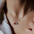 Load image into Gallery viewer, Paw Heart Pendant Necklace by Southlake Paws featuring a red heart charm and a paw print charm on a silver chain.