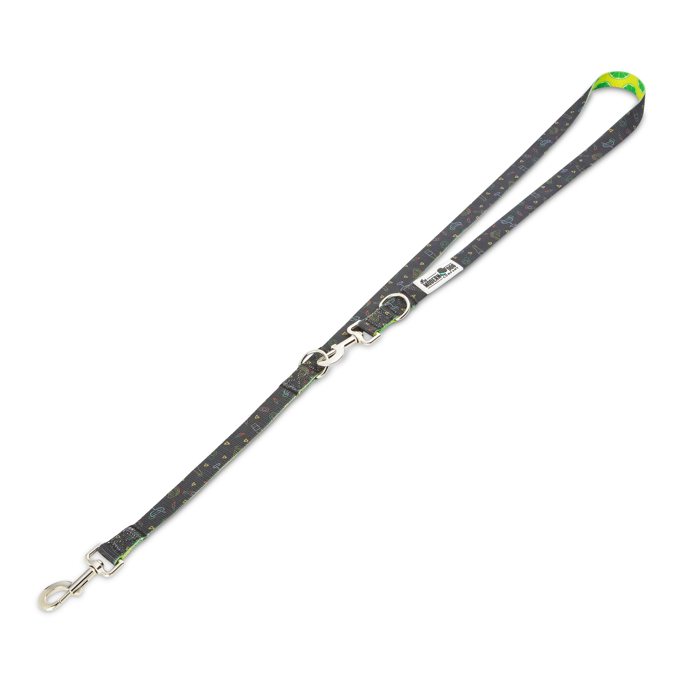 Retro Taco Tuesday Leash by The Modern Dog Company features a colorful taco print on a dark background with a green handle.