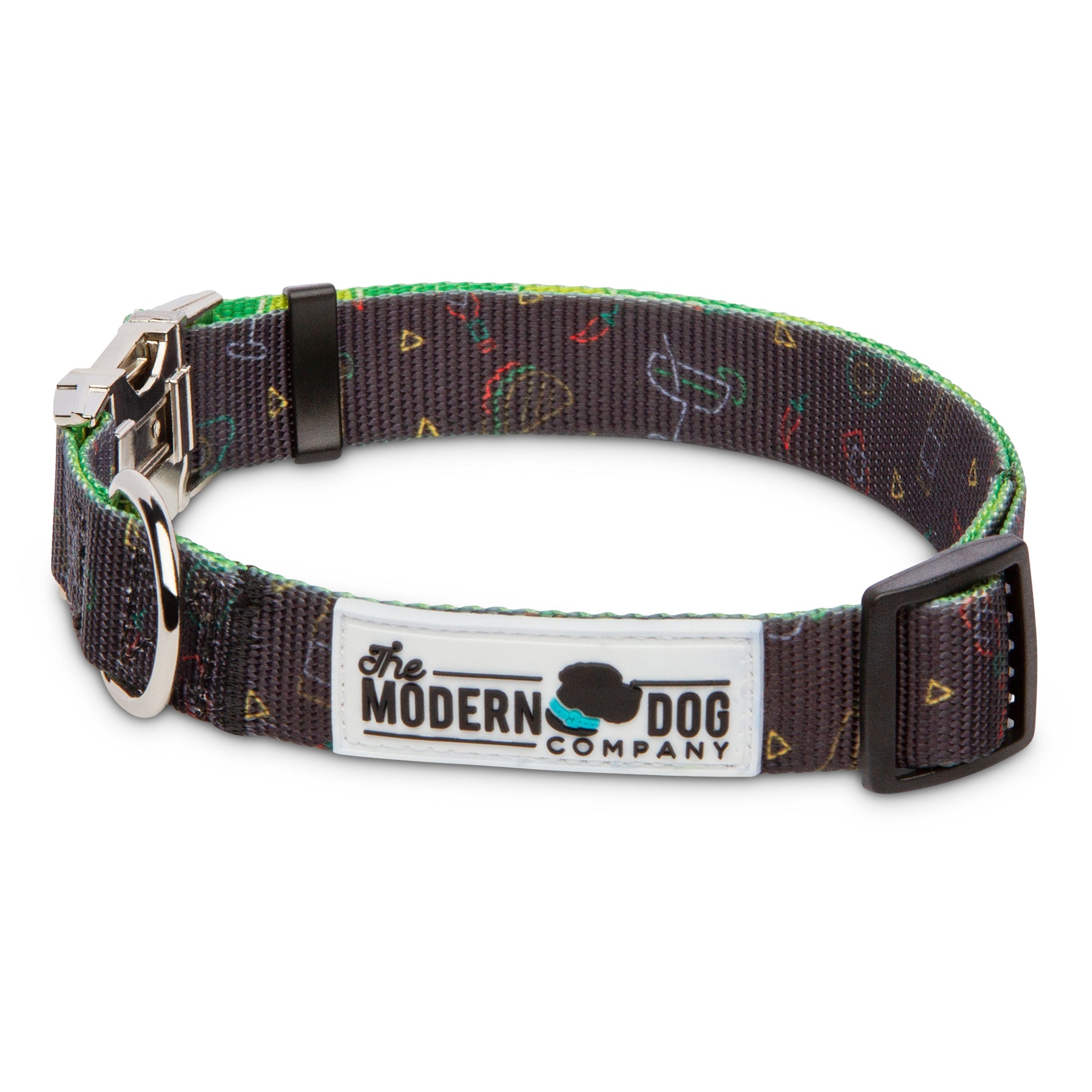 Retro Taco Tuesday Collar by The Modern Dog Company features a colorful taco print on a dark background with a sturdy buckle.