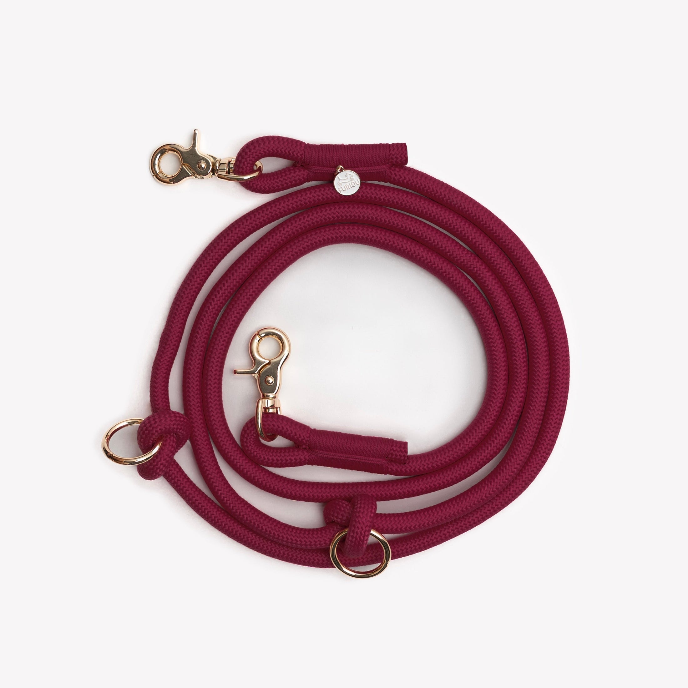 Hands-free braided leash in Bordeaux color by Southlake Paws, featuring gold clips and rings for versatility.