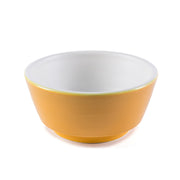 Yellow and white ceramic dog bowl