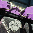 Load image into Gallery viewer, Purple Amethyst Elastic Equestrian Belt by Southlake Paws featuring silver hardware on a textured background with equestrian 
