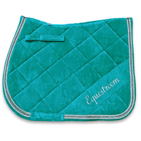 Teal saddle pad by Southlake Paws, featuring a quilted design and decorative trim, ideal for equestrian use.