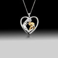 Load image into Gallery viewer, Girl Hugging Dog Heart Shaped Pendant- 925 Sterling Silver Two Toned Piece
