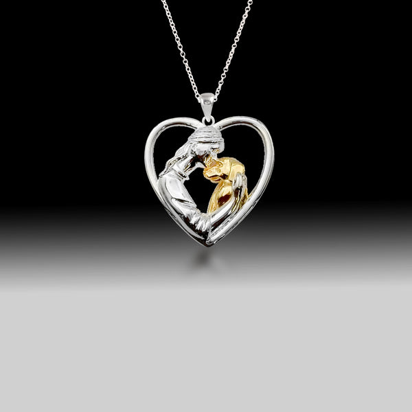 Heart-shaped pendant featuring a girl hugging a dog, crafted in 925 sterling silver with a two-toned finish.