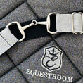 Load image into Gallery viewer, Royal Silver Elastic Equestrian Belt by Southlake Paws featuring a sleek design with shiny silver accents and sturdy clasps.

