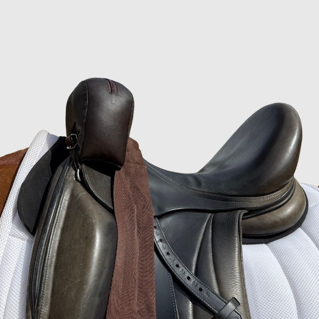 Sally Batton Pommel Blocker by Southlake Paws, featuring a padded leather design for added support on a saddle.