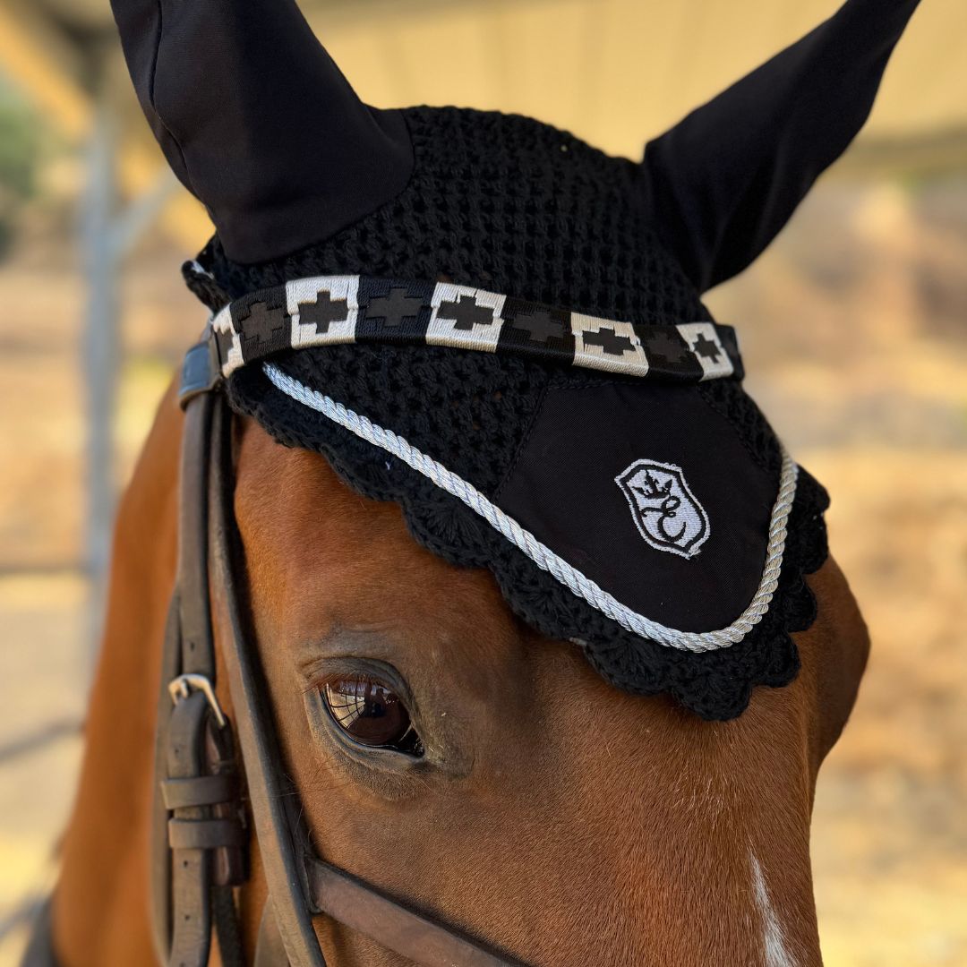 Black Fly Hat by Southlake Paws featuring a textured design, decorative band, and ear covers for horses.