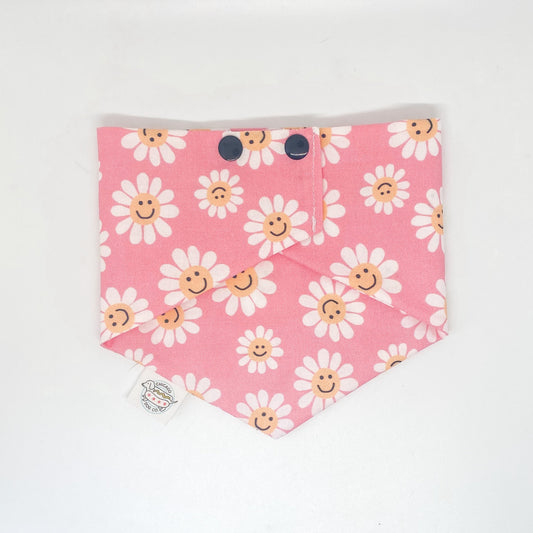 Spring Smiling Daisies Bandana by Southlake Paws features a pink background with cheerful daisies and smiling faces.