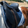 Load image into Gallery viewer, Patriot American Saddle Pad Set by Southlake Paws, featuring a navy pad with a black saddle on a horse's back.
