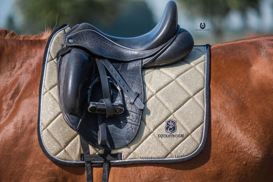 Champagne Saddle Pad by Southlake Paws, featuring a quilted design with a black saddle on a chestnut horse.