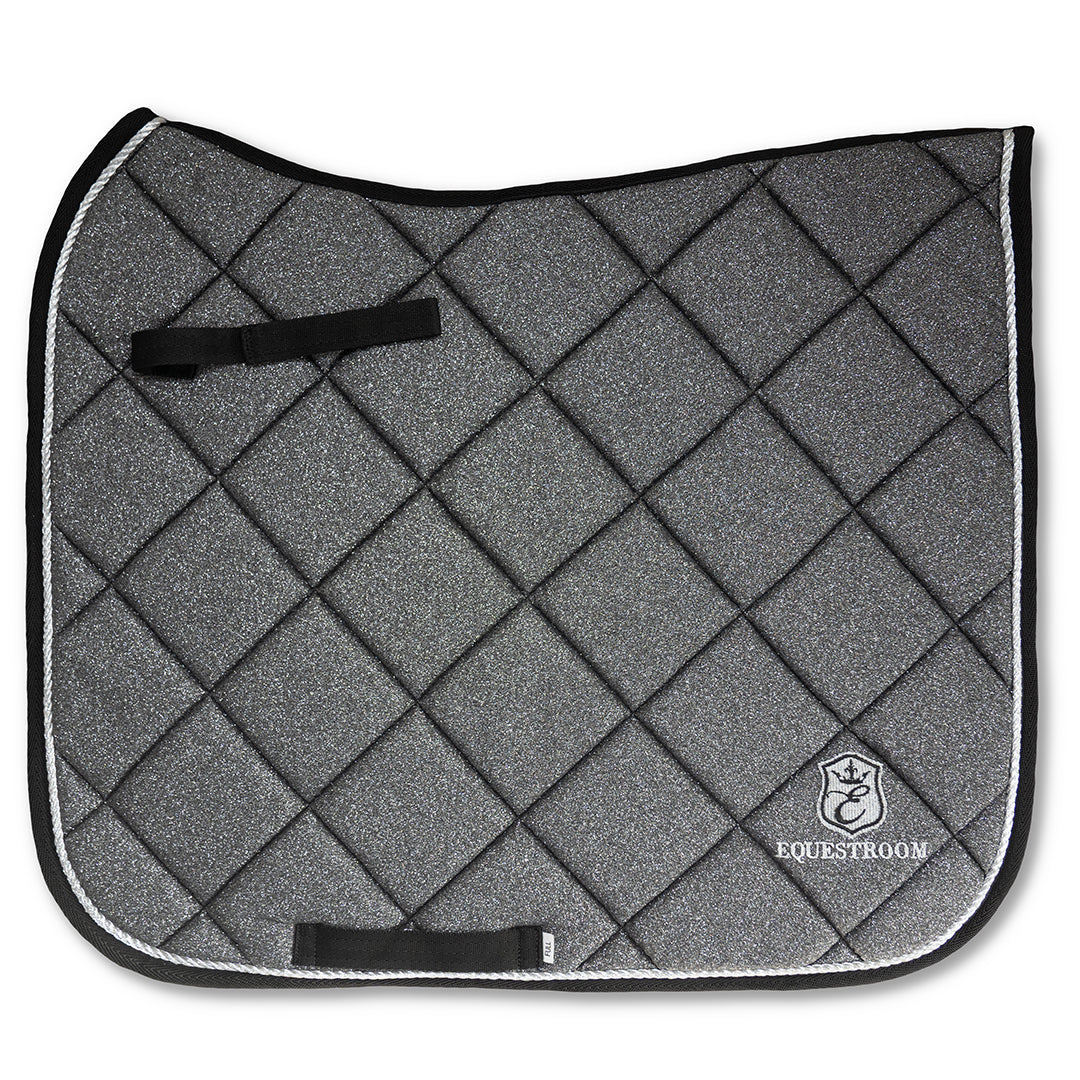 Stardust Grey Saddle Pad by Southlake Paws features a quilted design with a shimmering grey finish and black trim.