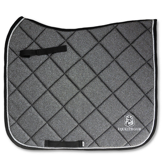 Stardust Grey Saddle Pad by Southlake Paws features a quilted design with a shimmering grey finish and black trim.