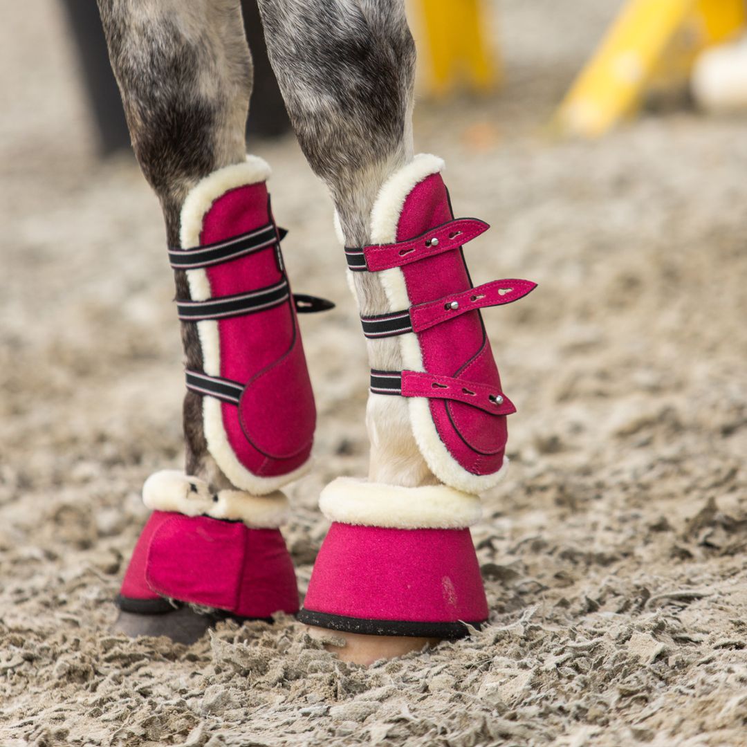 Southlake Paws Raspberry Fizz Open-front Boots in vibrant pink with black straps and fleece lining, designed for horse protec