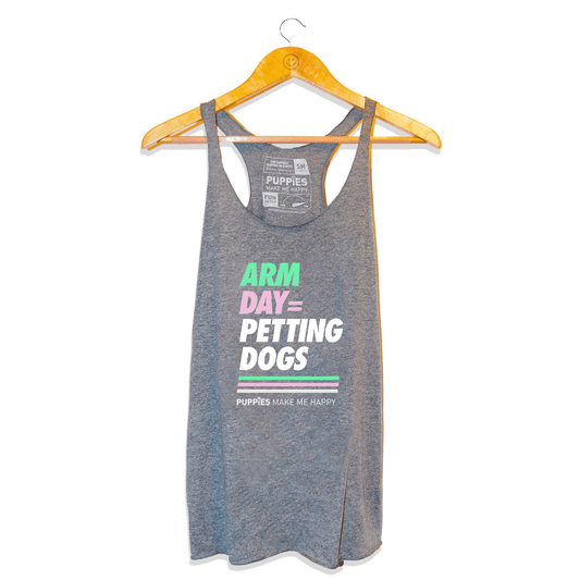 Gray racerback tank top featuring the text "ARM DAY = PETTING DOGS" in colorful lettering. Ideal gift for dog moms.