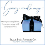 Blue gift box with black ribbon and 'Black Bow Jewelry Co.' branding on a light blue background.