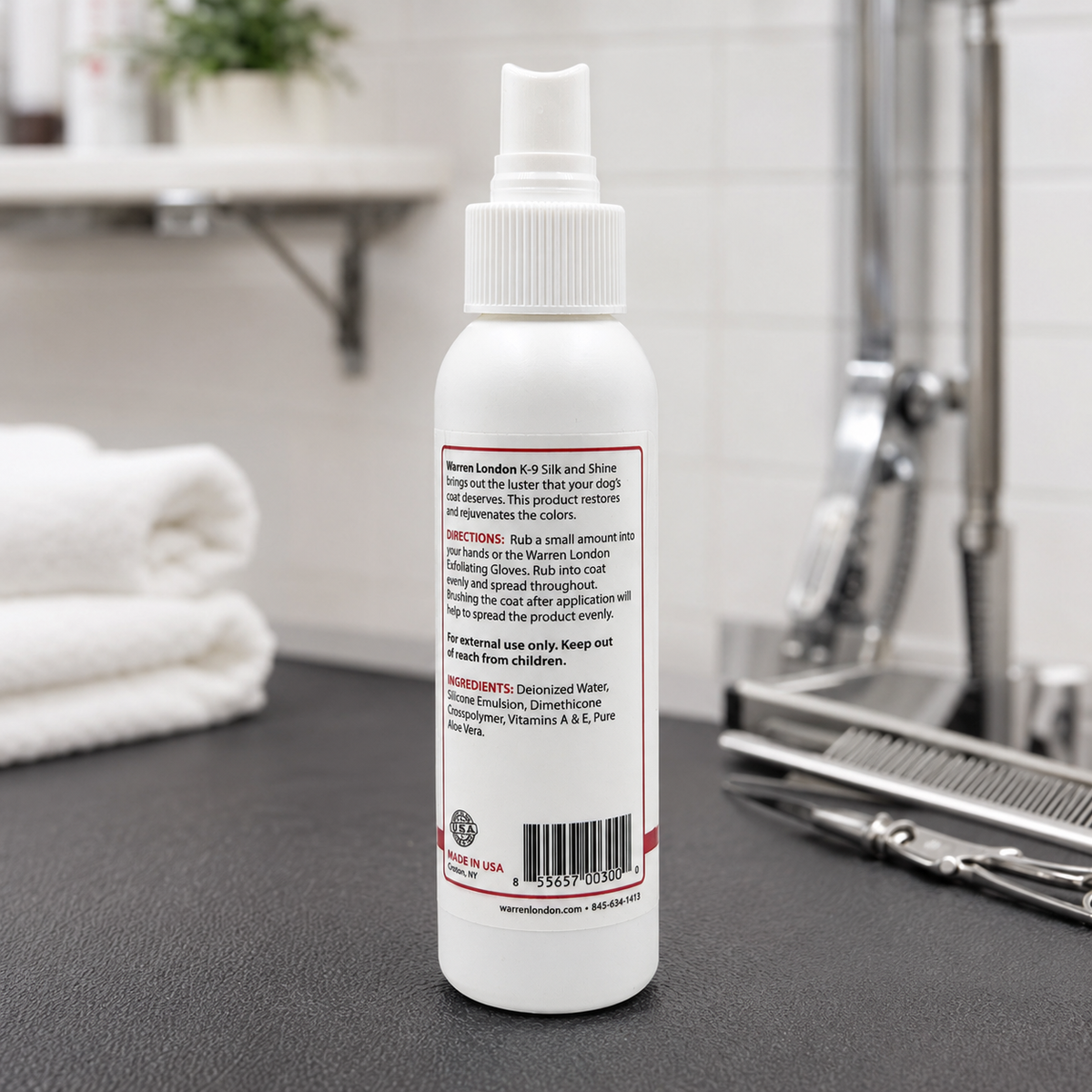 Southlake Paws K9 Silk & Shine spray bottle for revitalizing and shining pet coats, with detailed instructions on the back.