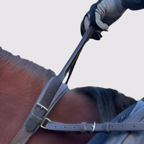 Double Neck Strap Extra Long Add-On Strap by Southlake Paws, shown being attached to a horse's harness.