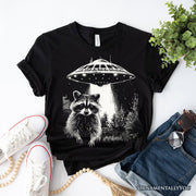 Funny UFO Raccoon T-Shirt, Black Unisex Tee for Alien Enthusiasts 