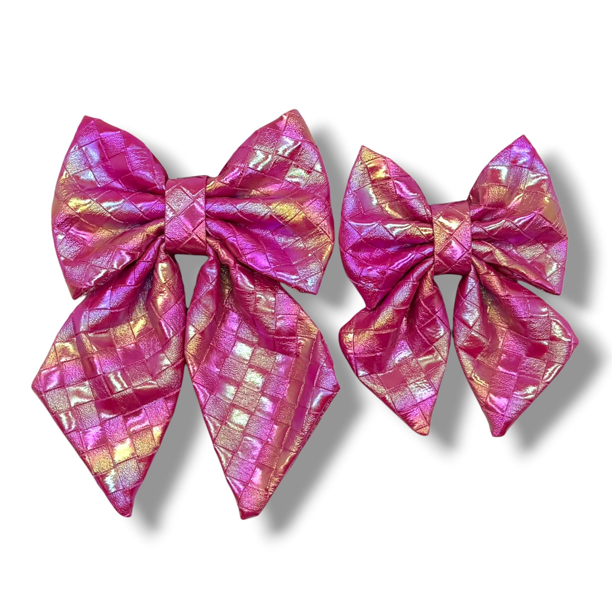 Fuchsia Meadows - Leather Flower Tie featuring two vibrant, shiny pink bows with a textured, woven pattern.