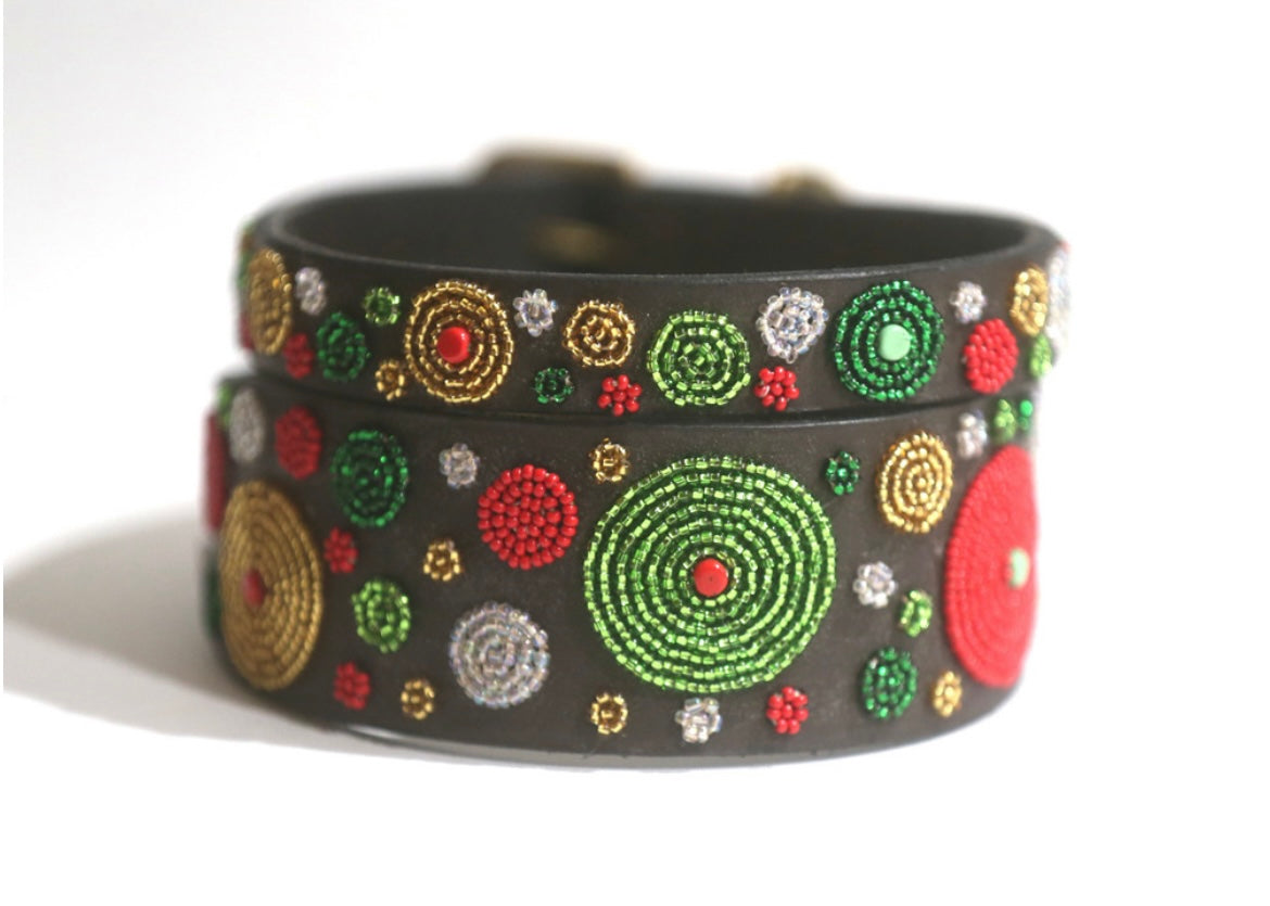 Beaded holiday belt by Southlake Paws featuring colorful circles in red, green, gold, and silver on a black background.