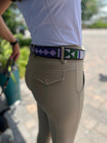 Load image into Gallery viewer, Southlake Paws TKC YTT Belt in Standard Width, featuring a colorful patterned design, worn with fitted riding pants.
