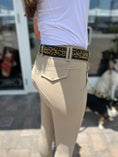 Load image into Gallery viewer, Southlake Paws TKC Leopard Belt in standard width, featuring a leopard print design, worn with beige pants.
