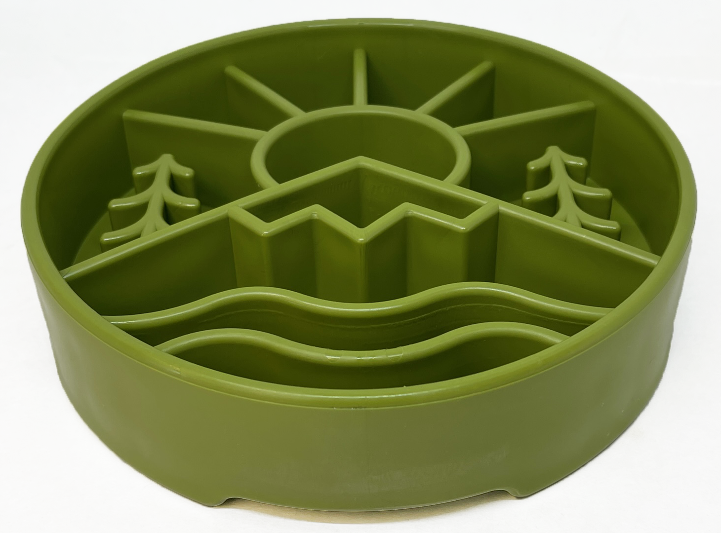 Green slow feeder dog bowl with outdoor-themed design featuring mountains, trees, and waves for enrichment. USA made.
